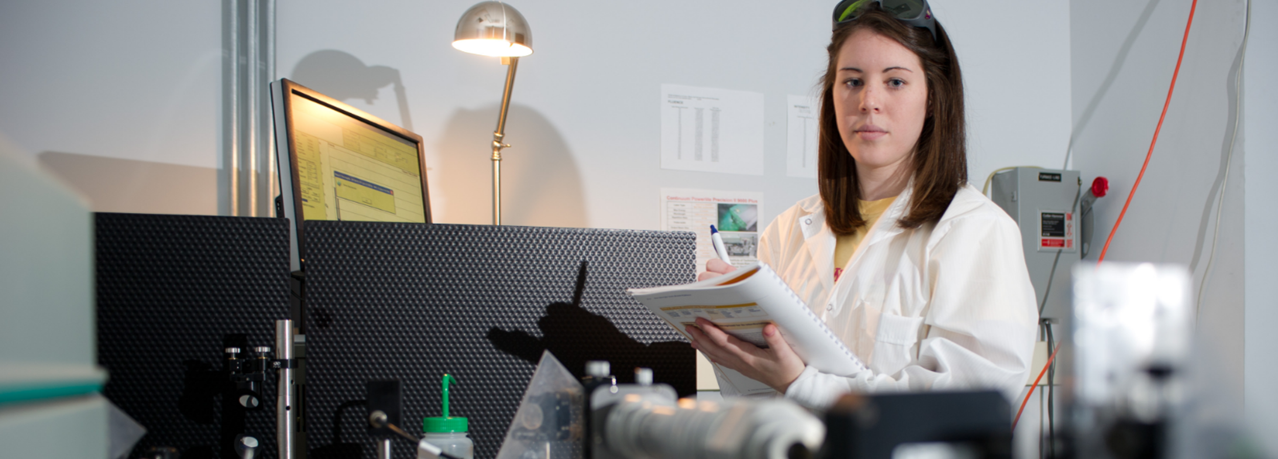 student reviewing experiment in lab