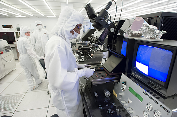Researchers working on chip development in Georgia Tech's cleanroom, the largest of its kind in the southeast.