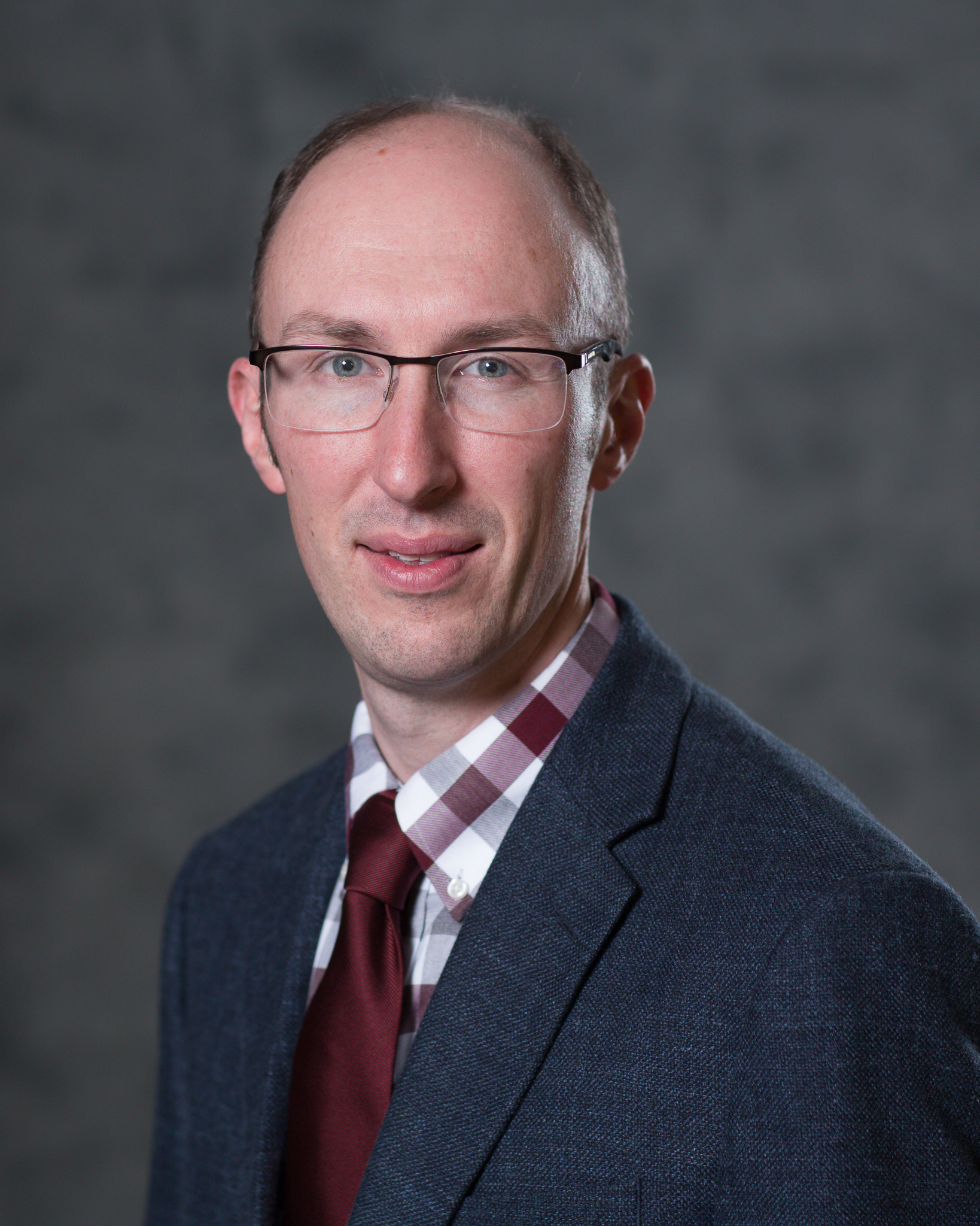 Headshot of John Christian, AE School Professor