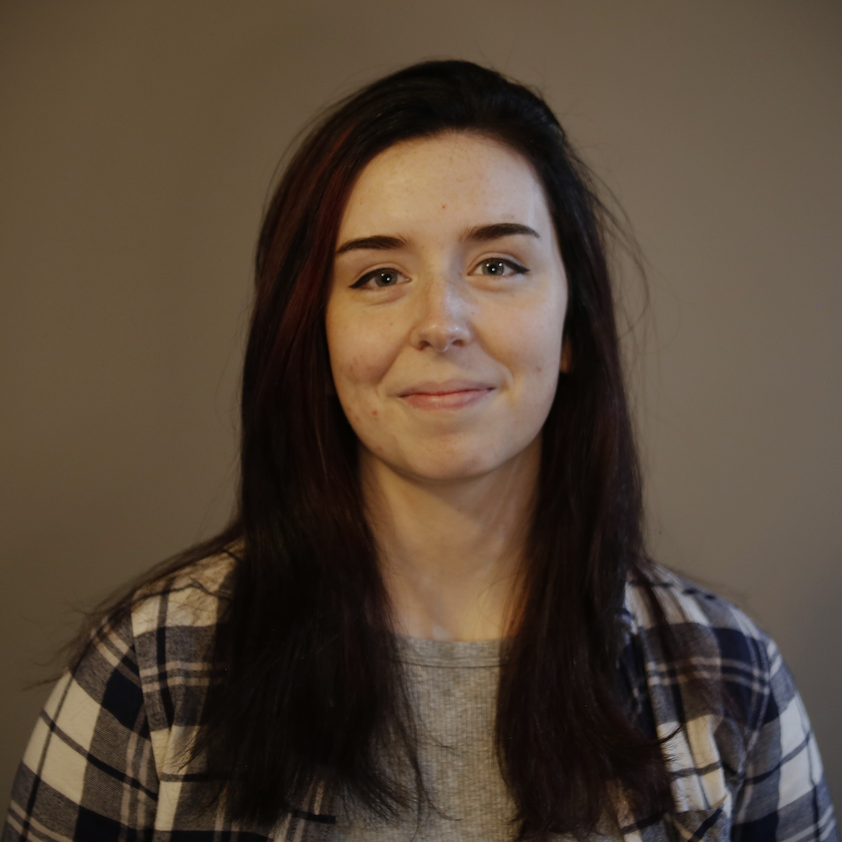 Headshot of Ava Thrasher, AE School alumna and research engineer