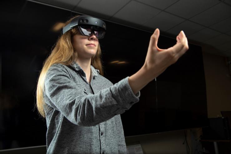 <p>GTRI Research Scientist Emily Strube (pictured) said that in addition to the battlefield, her team is also looking to incorporate this research into smart warehouses and to help users locate and manuever around chemical hazards (Photo Credit: Christopher Moore, GTRI).</p>
