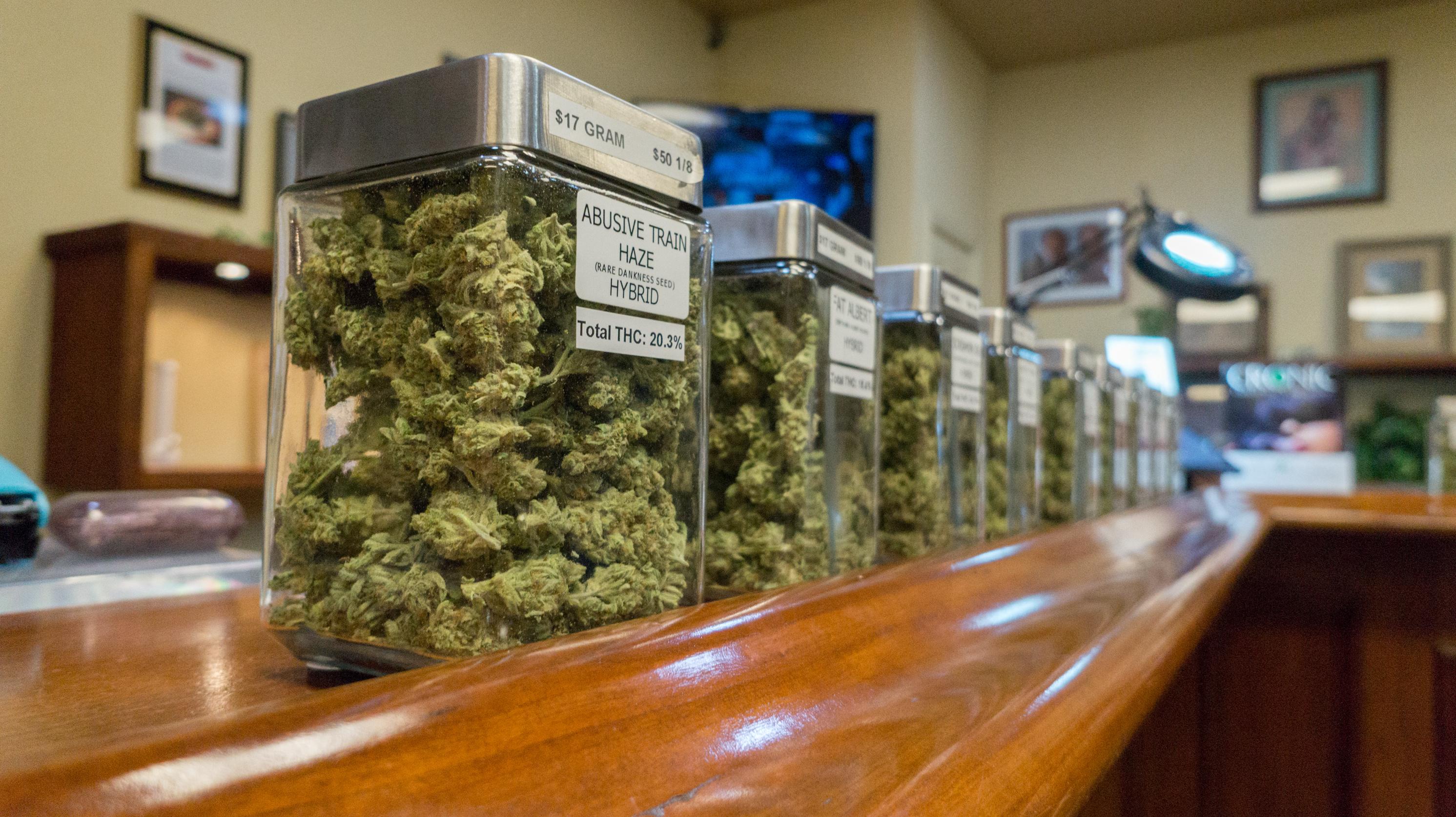 Jars of cannabis on display at a dispensary.