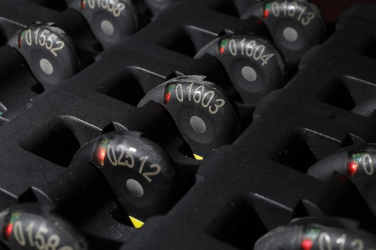 <p><em>The HIPS devices (pictured) look like standard heart rate monitors, but in addition to measuring heart rate, they also track a soldier's skin temperature and movements (Photo Credit: Christopher Moore, GTRI). </em></p>