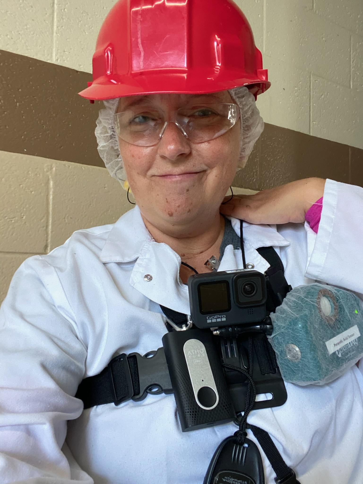 a photo of a woman, Hilarie Warren, in safety testing gear