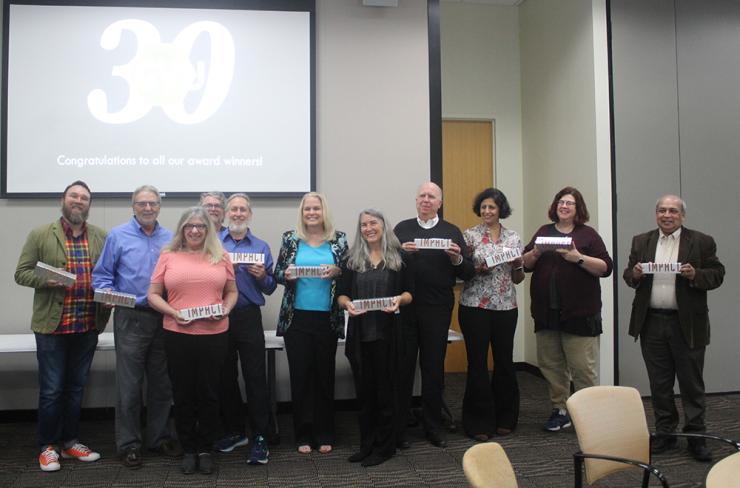<p>Pictured left-right: <strong>Clint Zeagler, Russ Clark, Laurie Baird, Keith Edwards, Matt Sanders, Melody Moore Jackson, Carrie Bruce, Dick Henneman, Neha Kumar, Heather Pritchett, and Ashok Goel</strong></p>