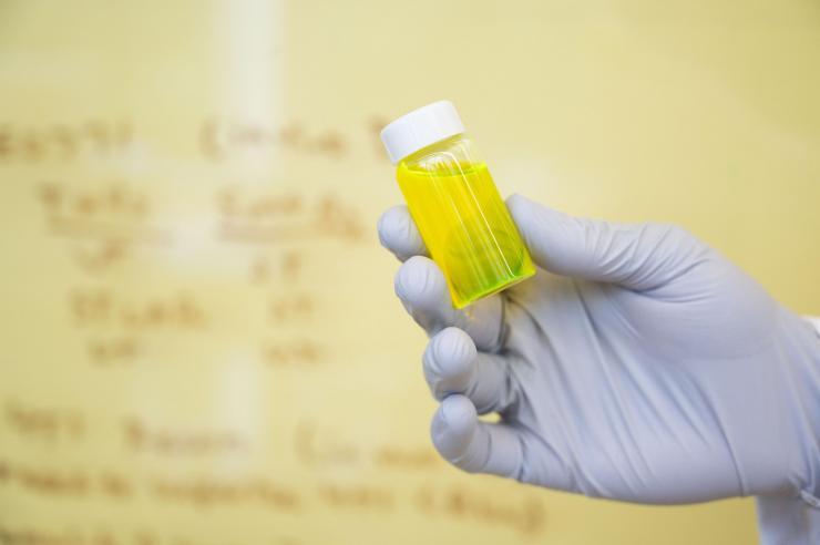 Yellow liquid in a small vial
