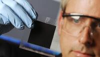 Lab director Tom Fuller holds up an experimental membrane for inspection.
