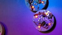 Small autonomous robots perform group tasks and their emergent behaviors are studied with big data techniques.