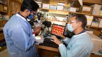 Researchers with the new microneedle