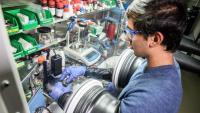 Researcher working on battery technology