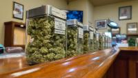 Jars of cannabis on display at a dispensary.