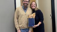 Michael Best, executive director of IPaT, presents Gillian Hayes with a gift bag before her IPaT distinguished alumnus talk on Oct. 17, 2024