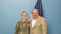Trisha Purvis (left), a veterinary surgical technician at the Global Center for Medical Innovation, recently re-enlisted in the United States Army Reserve. Ken Zielmanski, director of quality assurance for GCMI’s T3 Labs and a retired Army lieutenant colonel, performed the re-enlistment ceremony. (Photo: Joya Chapman)