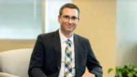 A photo of GTRI's interim Director Tommer Ender, who is seated. 