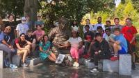 <p>Group photo of the participants of the 2022 Energy Unplugged summer camp on the Georgia Tech Atlanta campus staged around the Einstein bench statue/installation.</p>