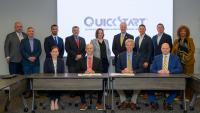 Georgia Quick Start Deputy Commissioner Scott McMurray (center left) and Georgia Tech Executive Vice President for Research Tim Lieuwen (center right) gathered with members of the Georgia Tech Manufacturing Institute, Georgia AIM, and more to officially commemorate the partnership on April 8.