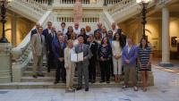 Group photo of Georgia Manufacturing Extension Partnership staff receiving a commendation from Georgia Gov. Brian Kemp.