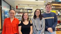 School of Biological Sciences Associate Professor Liang Han (left) with members of her lab, including Laboratory Technicians Katy Lawson (center left) and William Hancock (right), as well as biology Ph.D. student Rossie Nho.