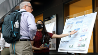 <p>Student presents a poster at IRIM’s Spring 2022 Robotics Research</p>