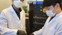 <p>Prof. Seung Woo Lee (left) and Michael J. Lee (right) have demonstrated a more cost-effective, safer solid polymer electrolyte (rubber material) for all-solid-state batteries. (Photo credit: Georgia Tech)</p>