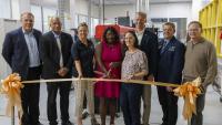 Partners of the facility gathered for an official ribbon cutting ceremony. 