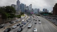 Traffic flows in and out of downtown Atlanta on the I-75/I-85 Connector Thursday, May 19, 2016, in Atlanta. (AP Photo/John Bazemore)