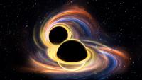 Artist's rendering of a collision of two black holes.