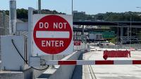 Gate blocking reversible lane