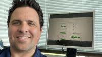 <p>GTRI researcher Levi Boggs is shown with a schematic showing the structure of a gigantic jet.</p>