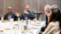 Benoit Montreuil speaking to the Axios roundtable group. Credit: Shay Richards for Axios