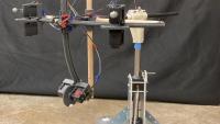 <p>Experimental realization of a swimmer on a sphere with actuated motors on a freely rotating boom arm.</p>