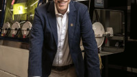 <p>Harnessing Automation: John Morehouse, director of the Georgia Center of Innovation for Manufacturing at the Georgia Department of Economic Development, with a laser cutter at Georgia Tech that produced a variety of parts Photo: Kevin Garrett</p>