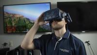 GTRI Research Scientist Dylan Bush demonstrates an F-16 simulation that was used to evaluate the Inter-rater Reliability of the scale of the simulation fidelity scale. (Credit: Christopher Moore)
