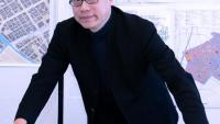 <p>Perry Yang with Tokyo Smart City designs, in the Eco Urban Lab</p>