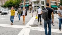 <p>People crossing the intersection in front of the Georgia Tech bookstore</p>