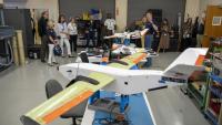 <p>GTRI researchers are developing new collaboration capabilities in small unmanned aerial systems, shown here being fabricated in a GTRI Cobb County laboratory. (Credit: Sean McNeil, GTRI)</p>